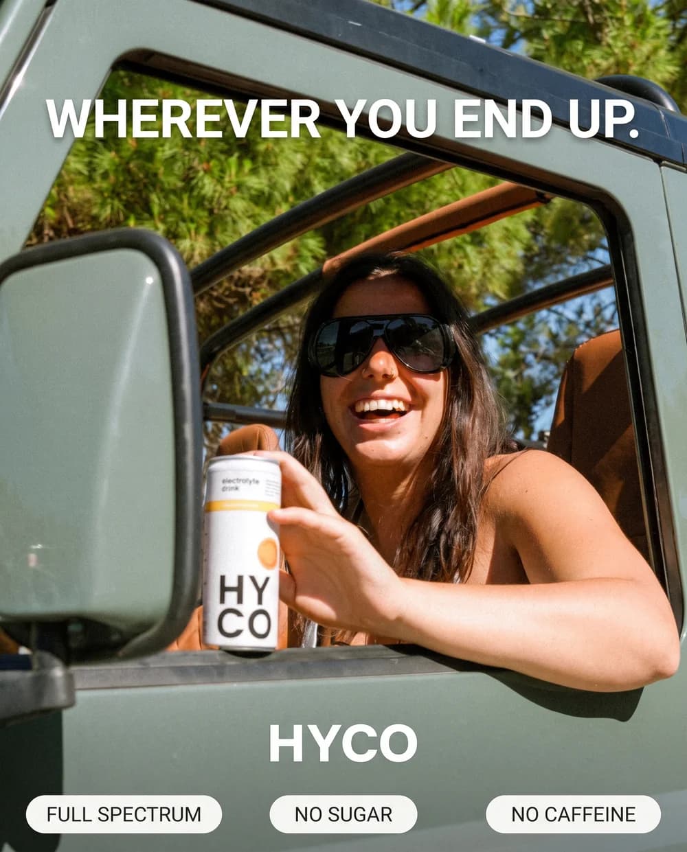 HYCO ad, a woman leaning out of a 4x4 window holding the can, headline wherever you end up, three benefit chips below